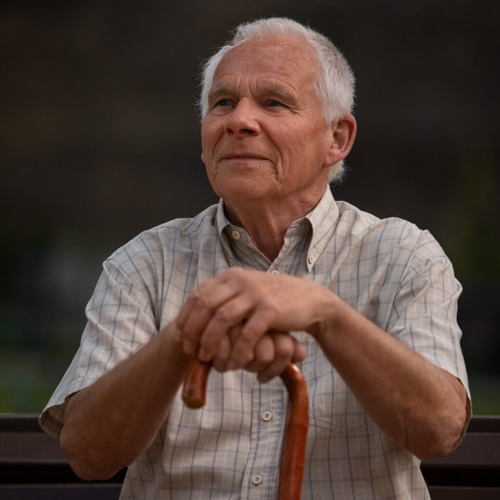 front view old man sitting bench quadrat or